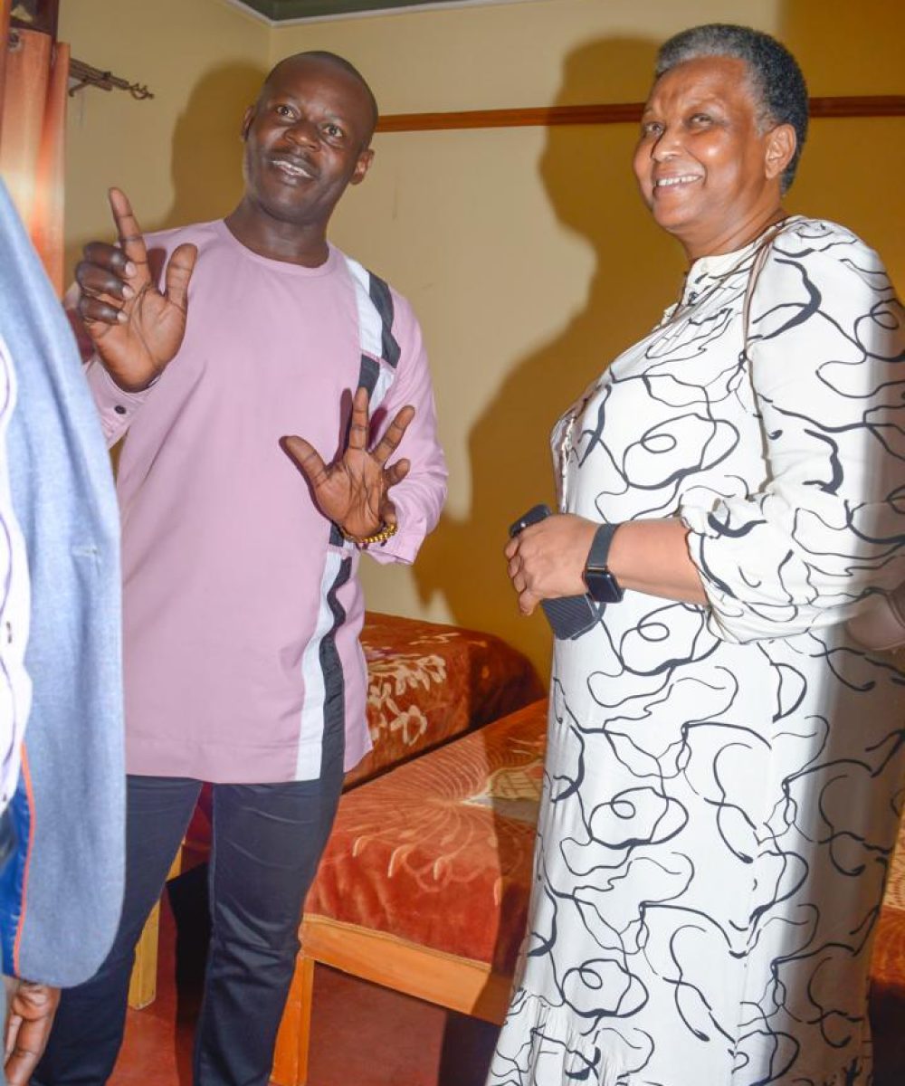 CEO taking touring the rooms and facility with Dr Katana special presidential adviser